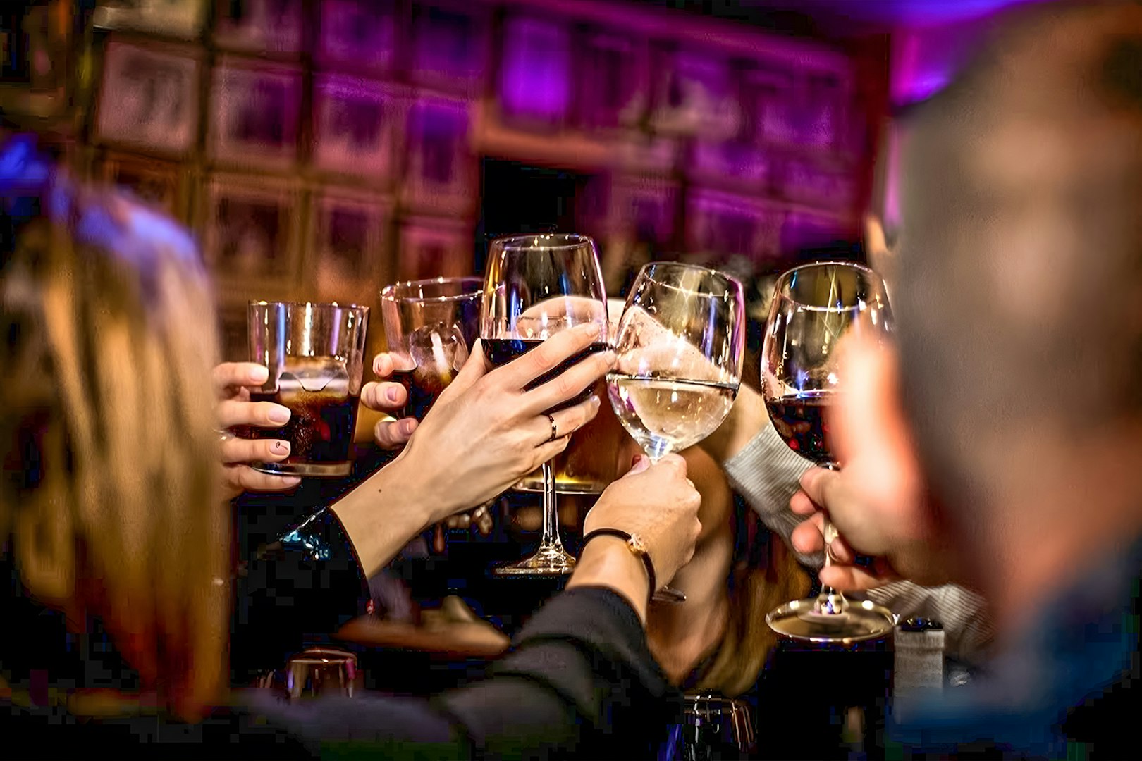 Guests toasting with drinks at Flamenco Show, Tablao El Toro y la Luna.