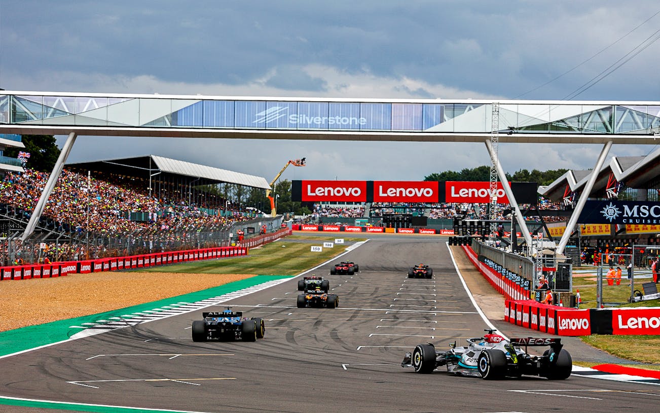 Race cars on track at Silverstone Circuit during British F1 Grand Prix, July 2023.