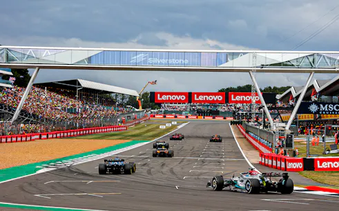 Race cars on track at Silverstone Circuit during British F1 Grand Prix, July 2023.