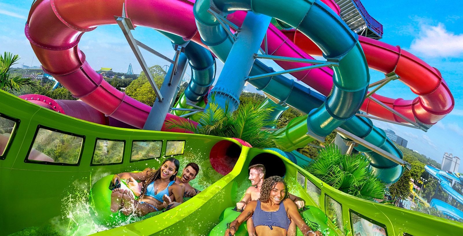 Visitors enjoying a water slide at Aquatica Orlando.