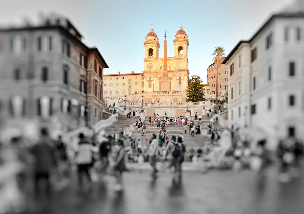 Crowds at the Spanish Steps with Trinità dei Monti church in Rome.