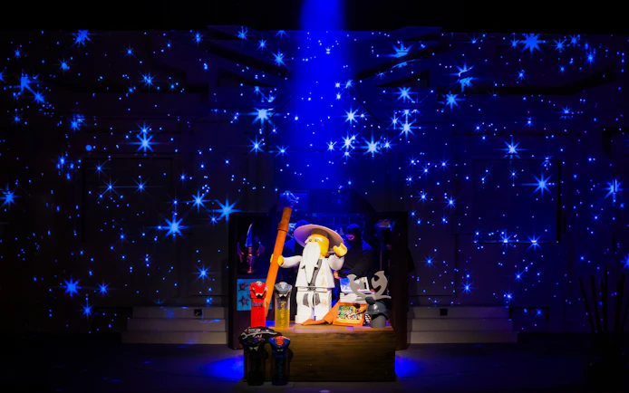 Lego wizard figure with staff surrounded by stars at Legoland Japan.