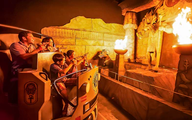 Family enjoying the Challenge of Tutankhamon ride at Walibi Belgium.