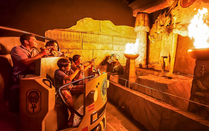 Family enjoying the Challenge of Tutankhamon ride at Walibi Belgium.