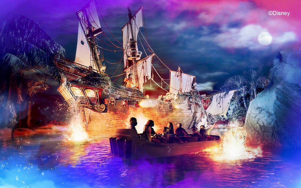 Boat ride near pirate ship at Disneyland Paris attraction.