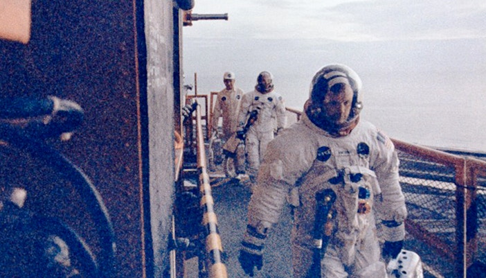 Apollo 11 crew at Launch Complex 39 Pad A before lunar mission.