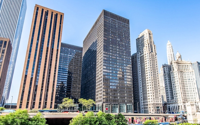 Skyscrapers at 111 E. Wacker Dr. in Chicago with clear blue sky.