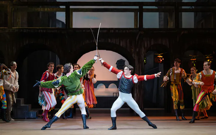 Dancers performing a sword fight scene in Australian Ballet's Romeo and Juliet.