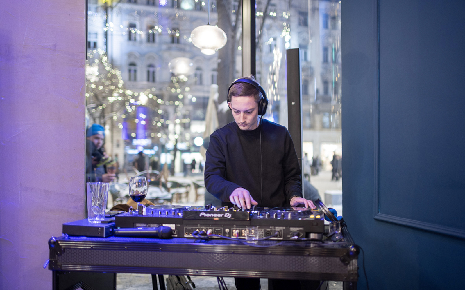 DJ performing at Czech tapas cuisine tasting tour with drinks in Prague.