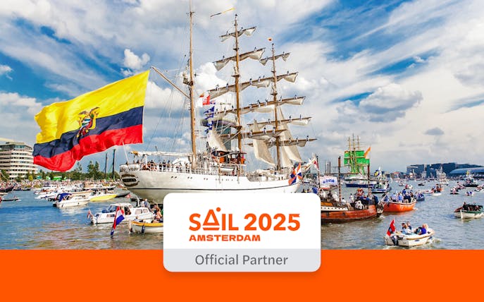 Tall ships and boats on the water during Sail Amsterdam 2025 event.