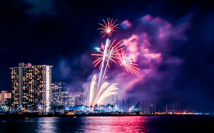 Fireworks display over Waikiki skyline, Honolulu, Oahu, Hawaii.