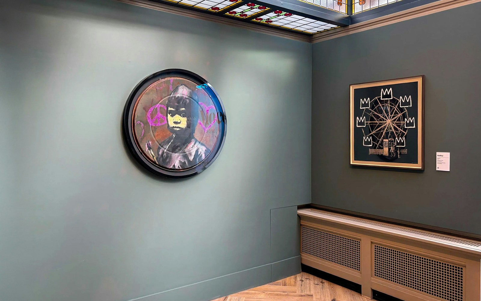 Art exhibits featuring modern graffiti and abstract art inside Moco Amsterdam.