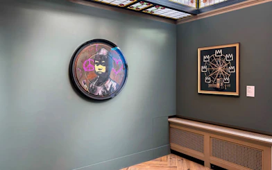 Art exhibits featuring modern graffiti and abstract art inside Moco Amsterdam.