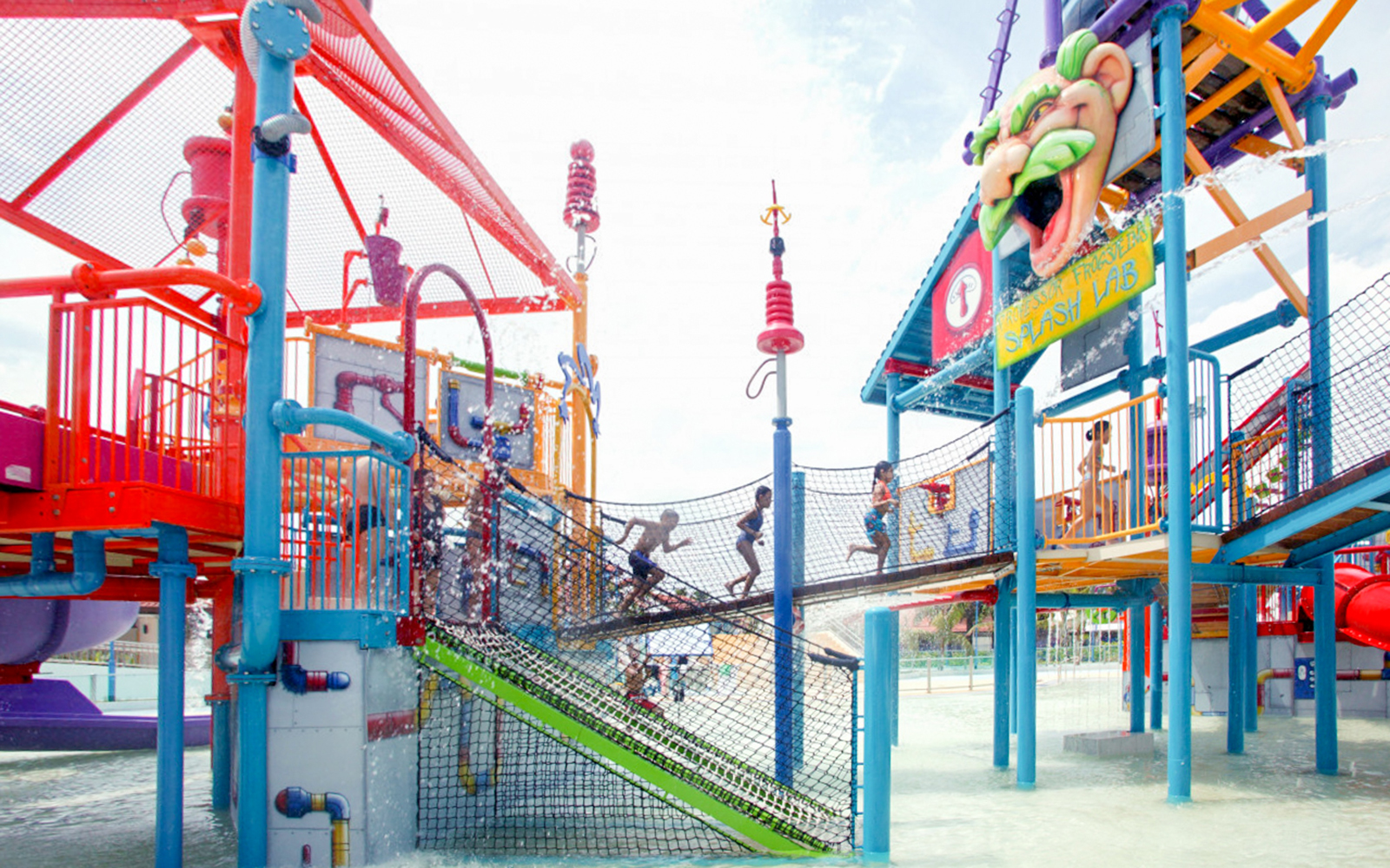 Children playing at Splash Lab in Wild Wild Wet water park, Singapore.