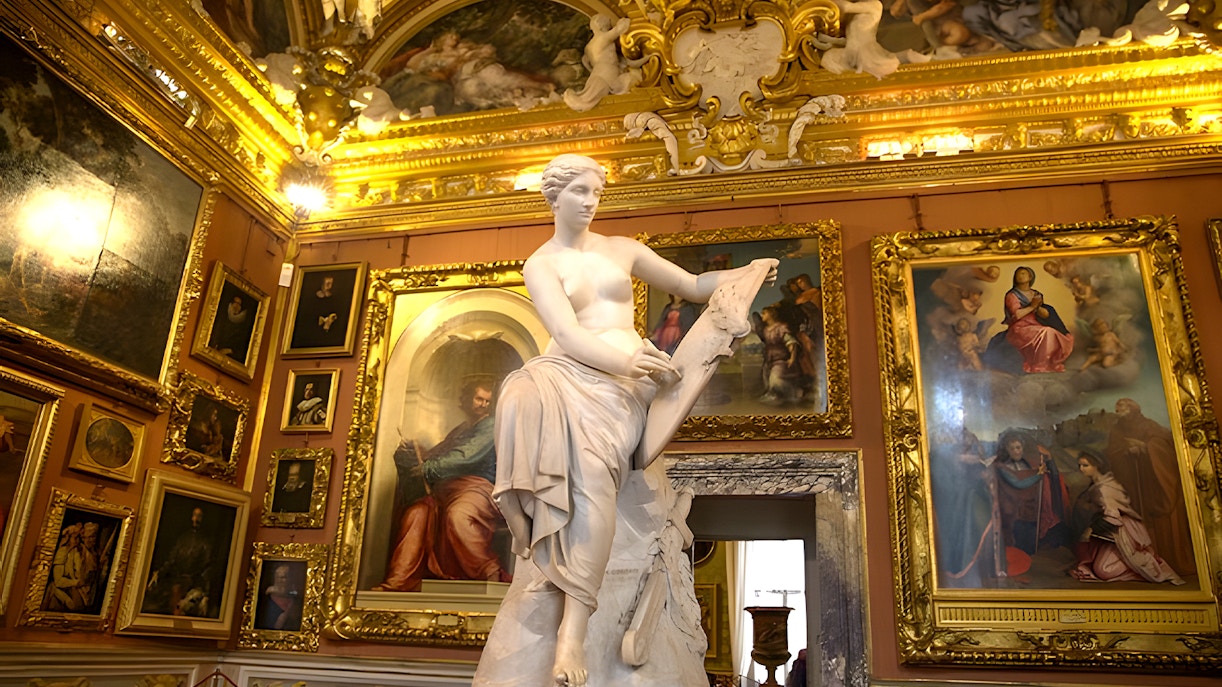 Palazzo Pitti interior with classical statue and Renaissance paintings, Florence.