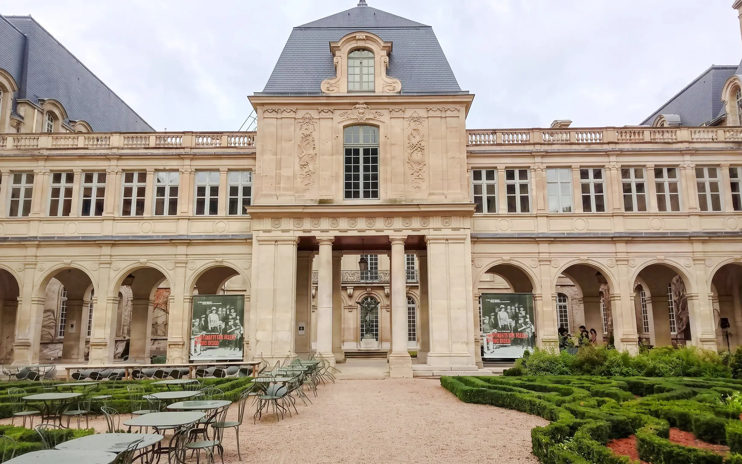 Carnavalet Museum courtyard with historic architecture and garden in Paris.