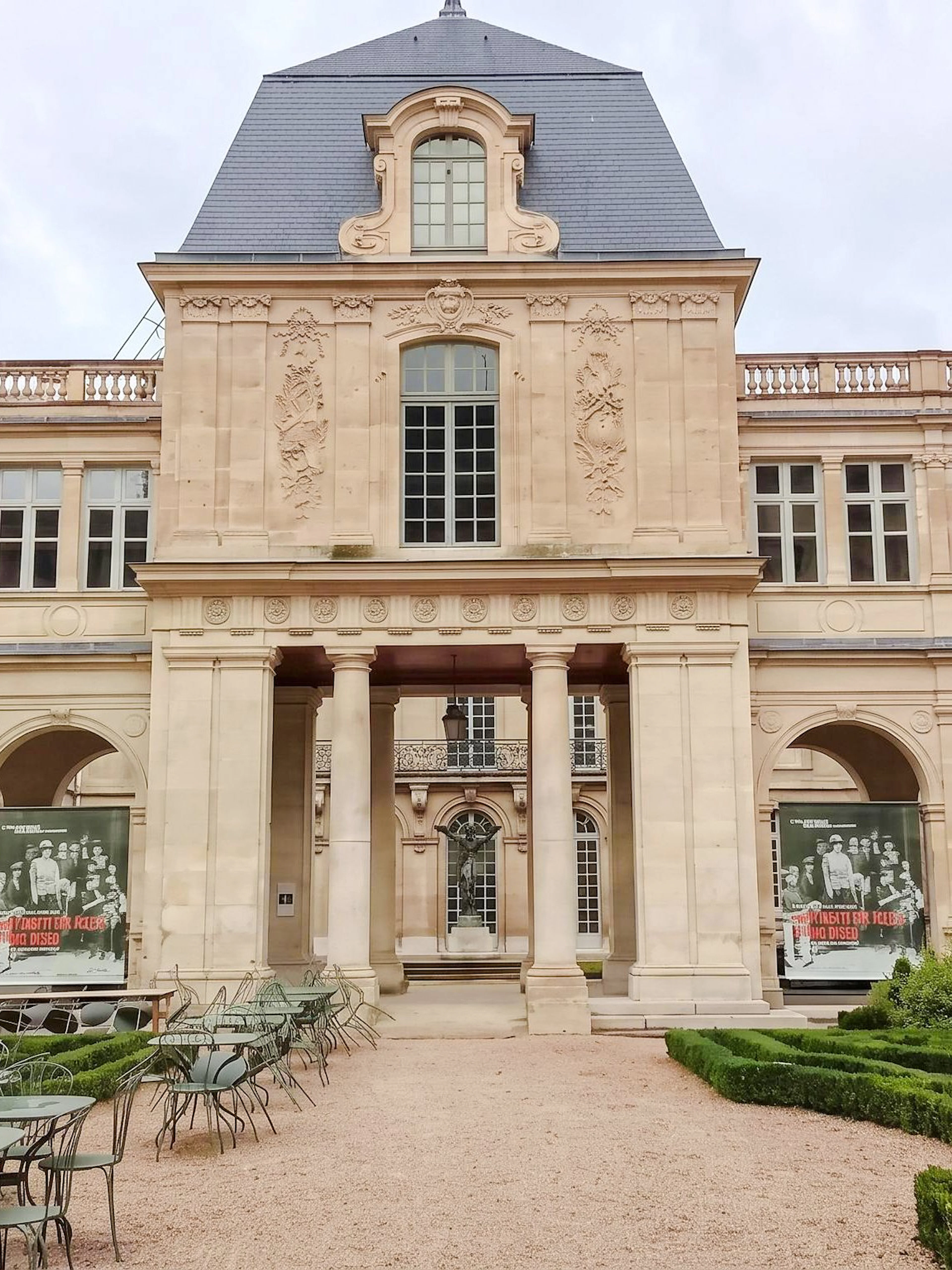 Carnavalet Museum courtyard with historic architecture and garden in Paris.