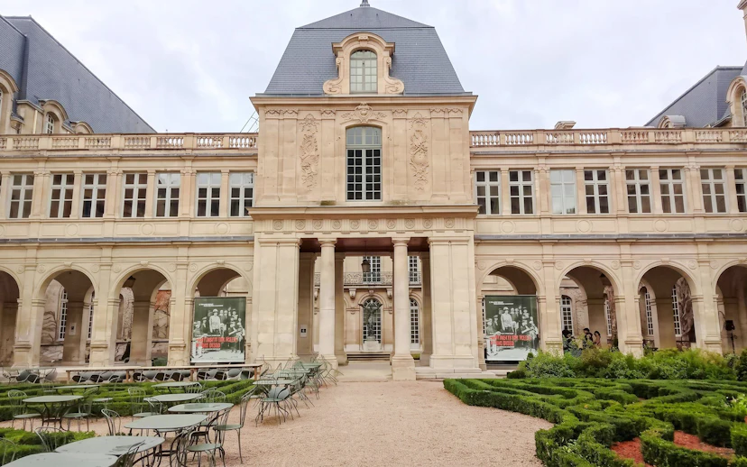 Carnavalet Museum courtyard with historic architecture and garden in Paris.