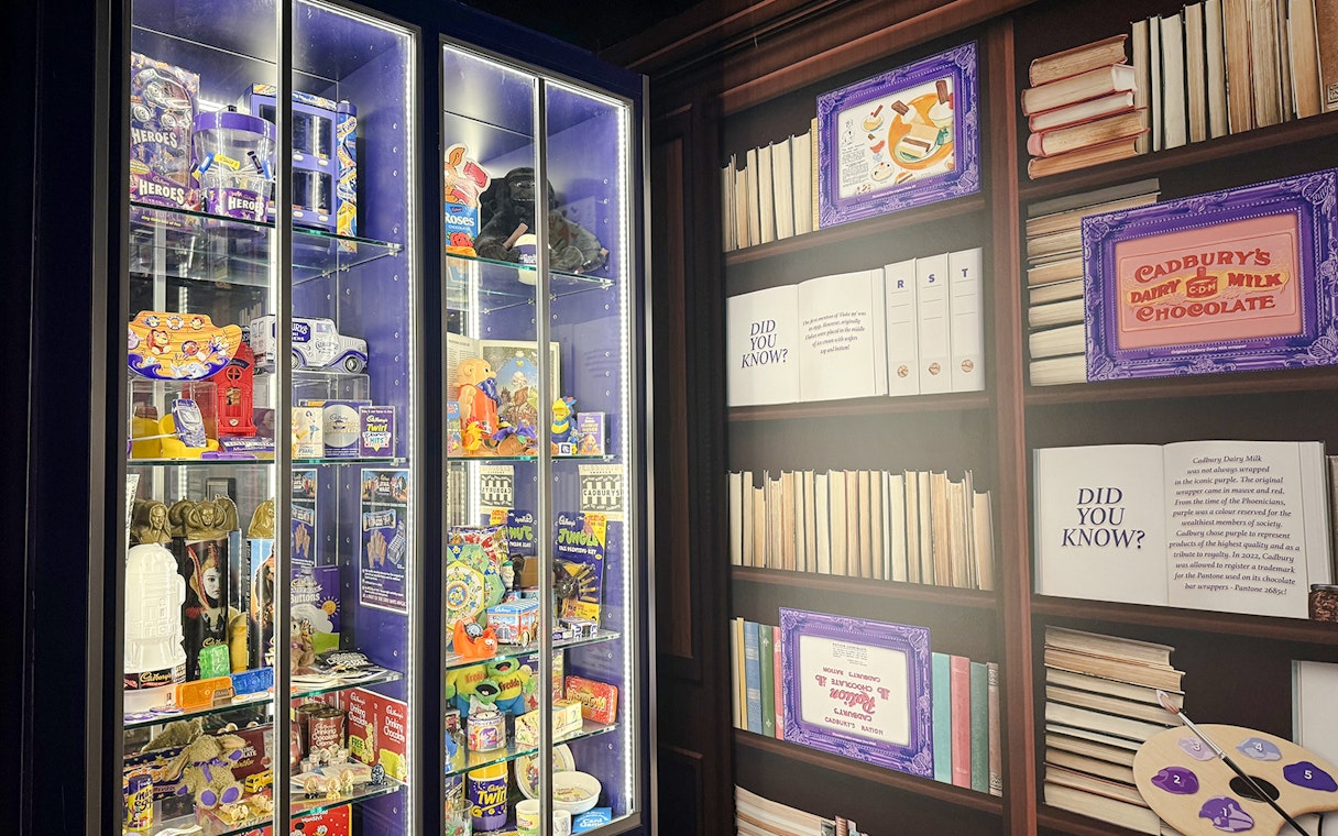 Display of Cadbury memorabilia and historical information at Cadbury World Bourneville Experience.