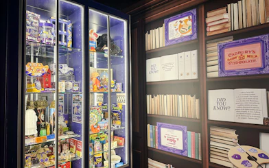 Display of Cadbury memorabilia and historical information at Cadbury World Bourneville Experience.