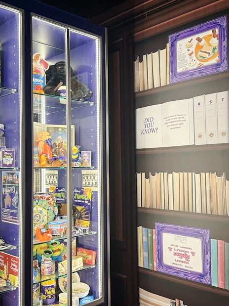 Display of Cadbury memorabilia and historical information at Cadbury World Bourneville Experience.