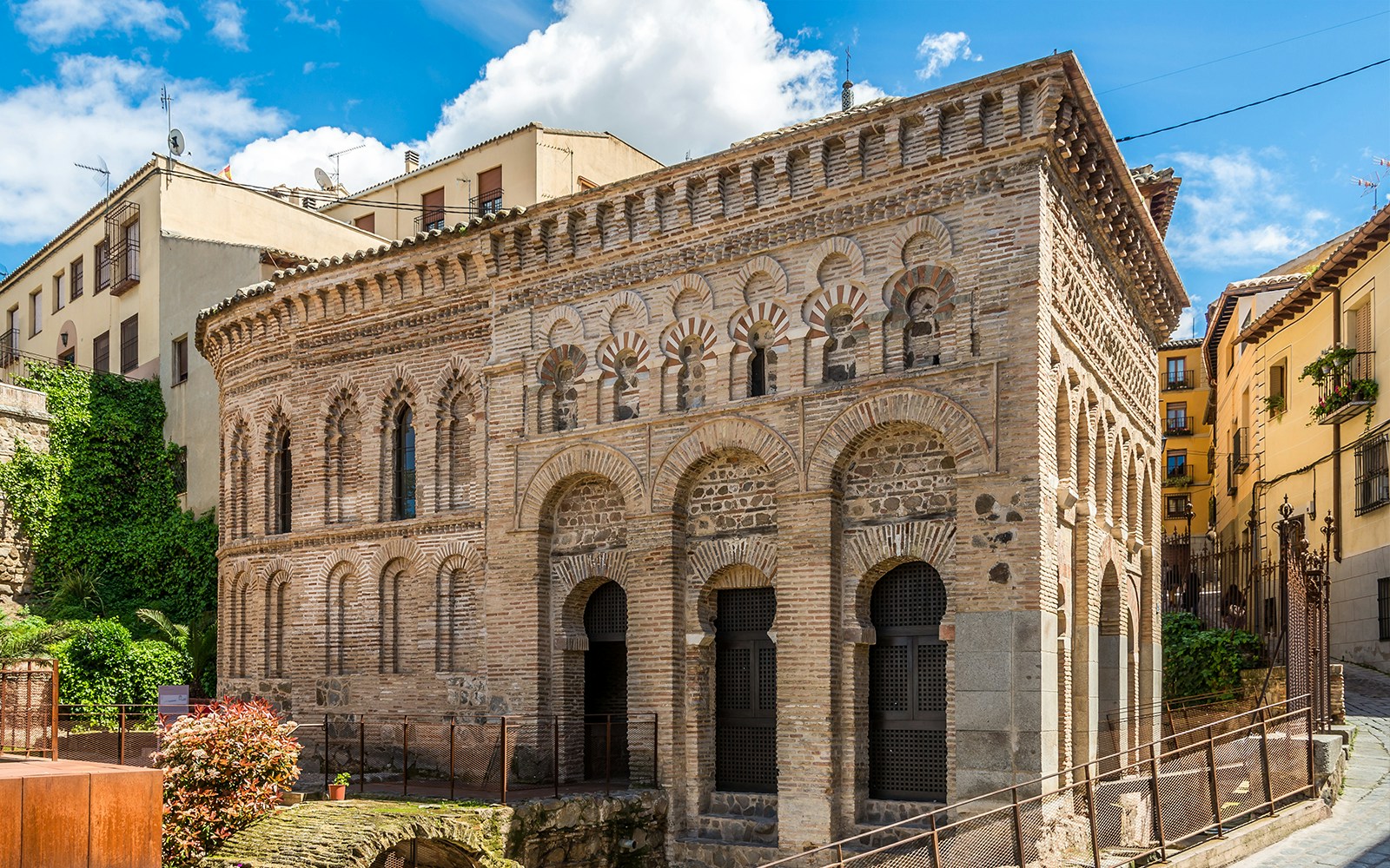 Mosque of Cristo de la Luz Chapel in Toledo with intricate brickwork and horseshoe arches