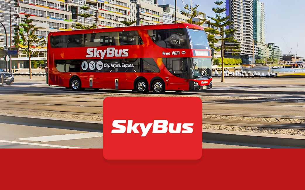 Skybus double-decker shuttle in Melbourne city, offering airport transfers.