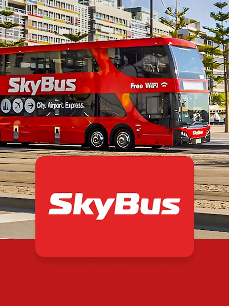 Skybus double-decker shuttle in Melbourne city, offering airport transfers.
