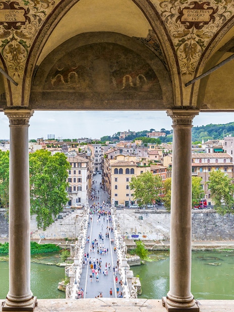 View of Rome from Castel Sant'Angelo, overlooking the Tiber River and cityscape.