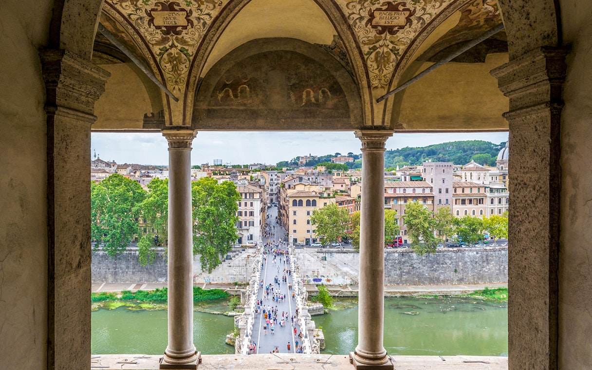 View of Rome from Castel Sant'Angelo, overlooking the Tiber River and cityscape.