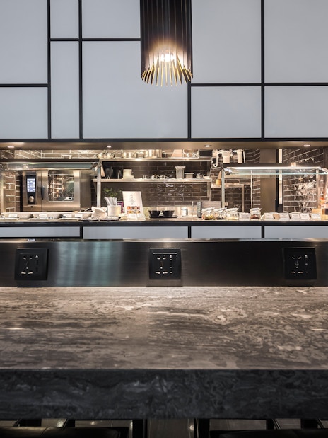 Plaza Premium Lounge dining area with buffet setup, Zone A1, Taipei, Taiwan.