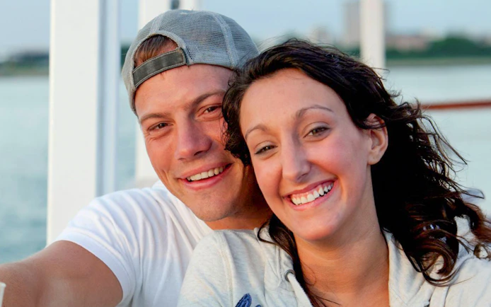 Guests smiling on Lake Michigan Skyline Cruise.