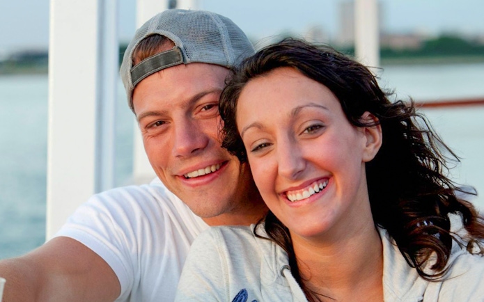 Guests smiling on Lake Michigan Skyline Cruise.