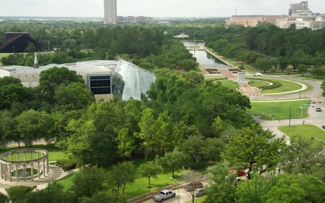 Aerial view of Houston Museum District with lush greenery and modern architecture.