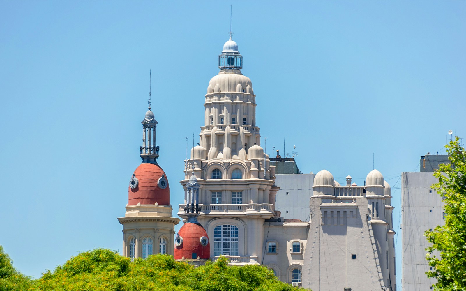 Palacio Barolo's ornate towers against a clear sky in Buenos Aires, Argentina.