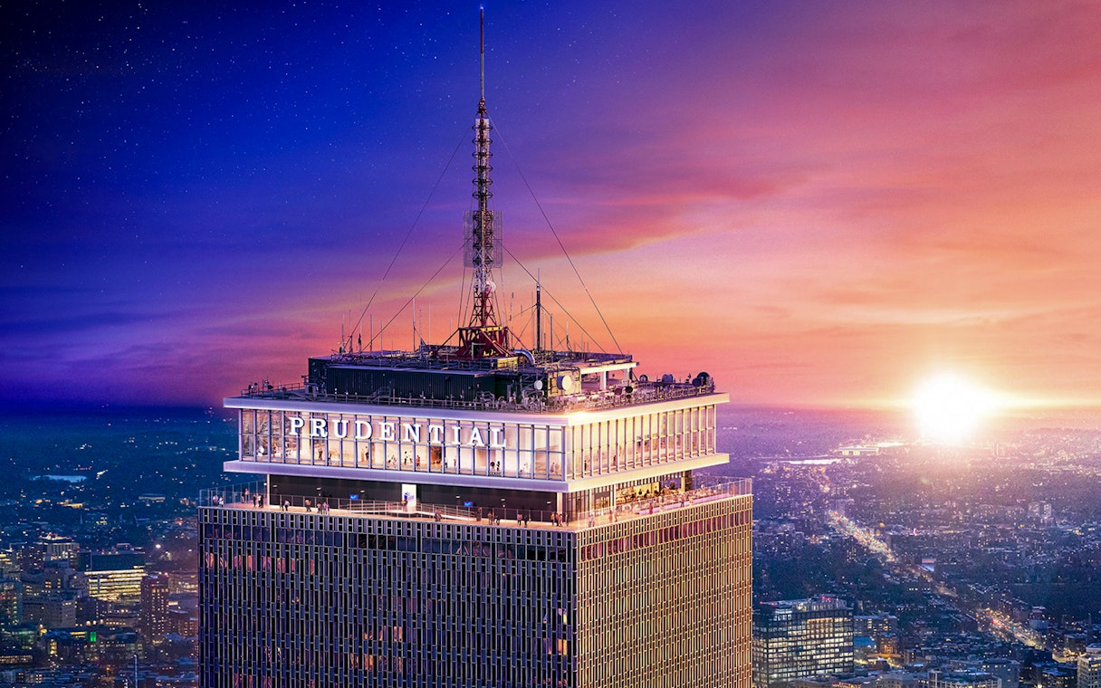 Prudential Tower in Boston at sunset with cityscape view.