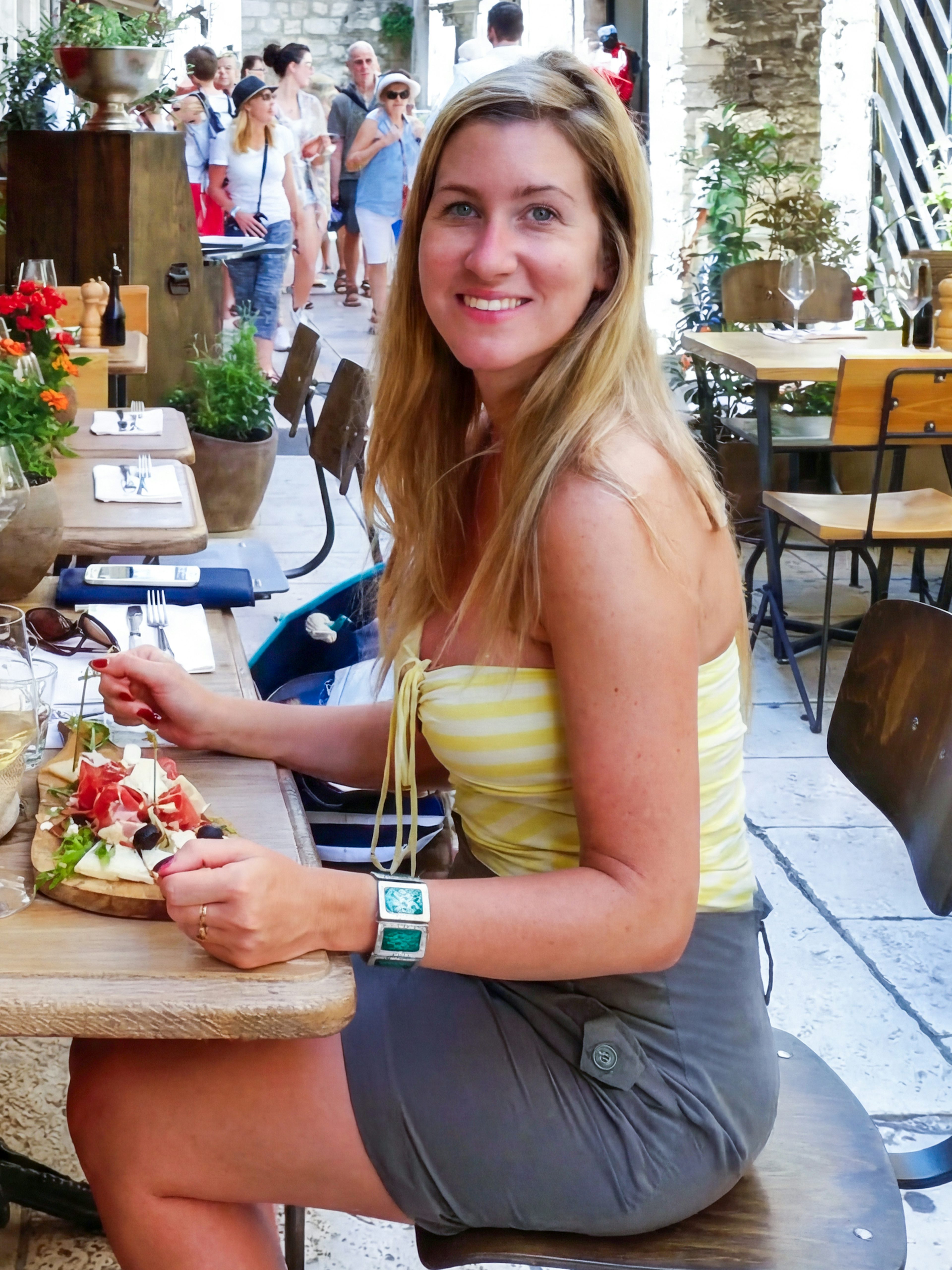 Guests enjoying wine tasting at a cafe in Diocletian’s Palace, Split.