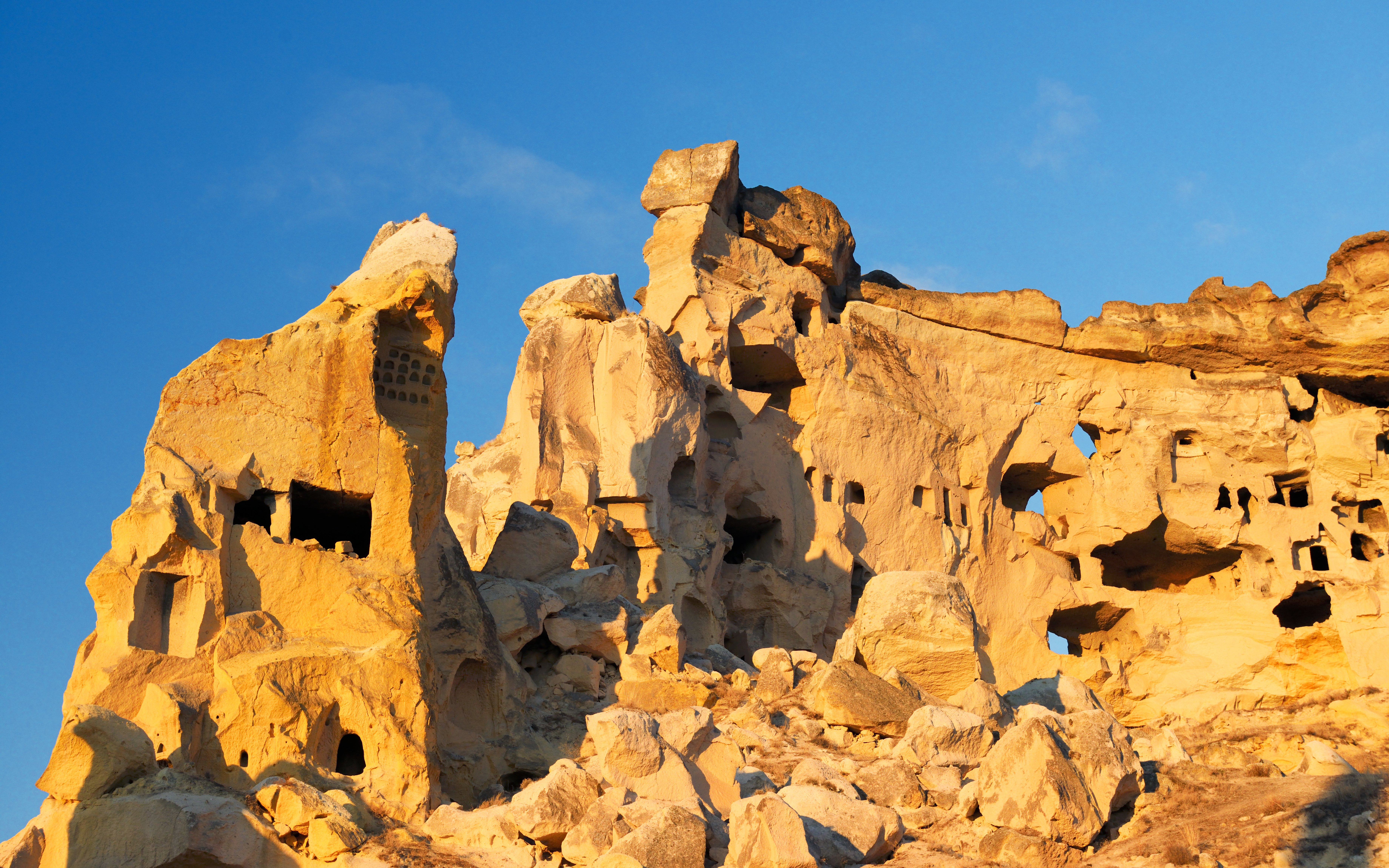 Cliff dwellings of ancient Christian churches in Cavusin, Cappadocia, Turkey.