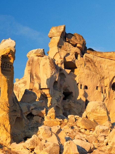 Cliff dwellings of ancient Christian churches in Cavusin, Cappadocia, Turkey.