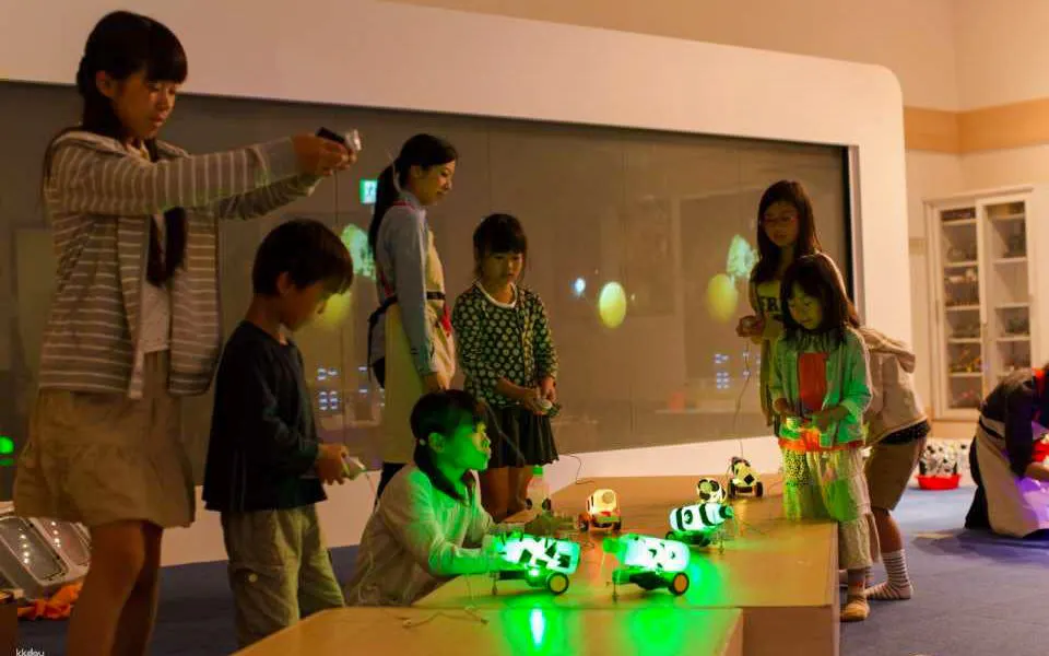 Children engaging with interactive exhibits at Kids Plaza Osaka.