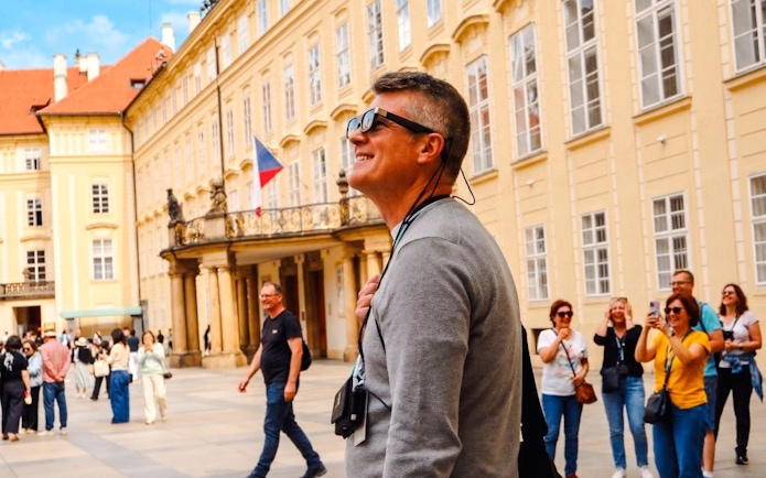 Guests using AR glasses on Prague Castle Time Travel Tour.