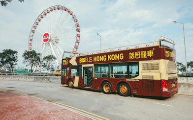 Hop-on hop-off bus near Hong Kong Observation Wheel on Victoria Harbor tour.
