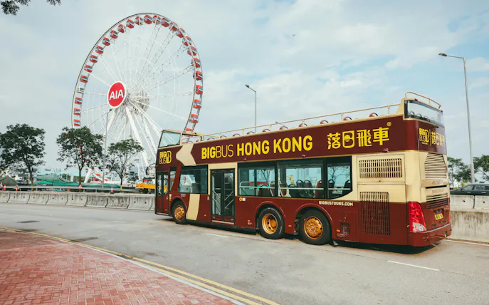 Hop-on hop-off bus near Hong Kong Observation Wheel on Victoria Harbor tour.