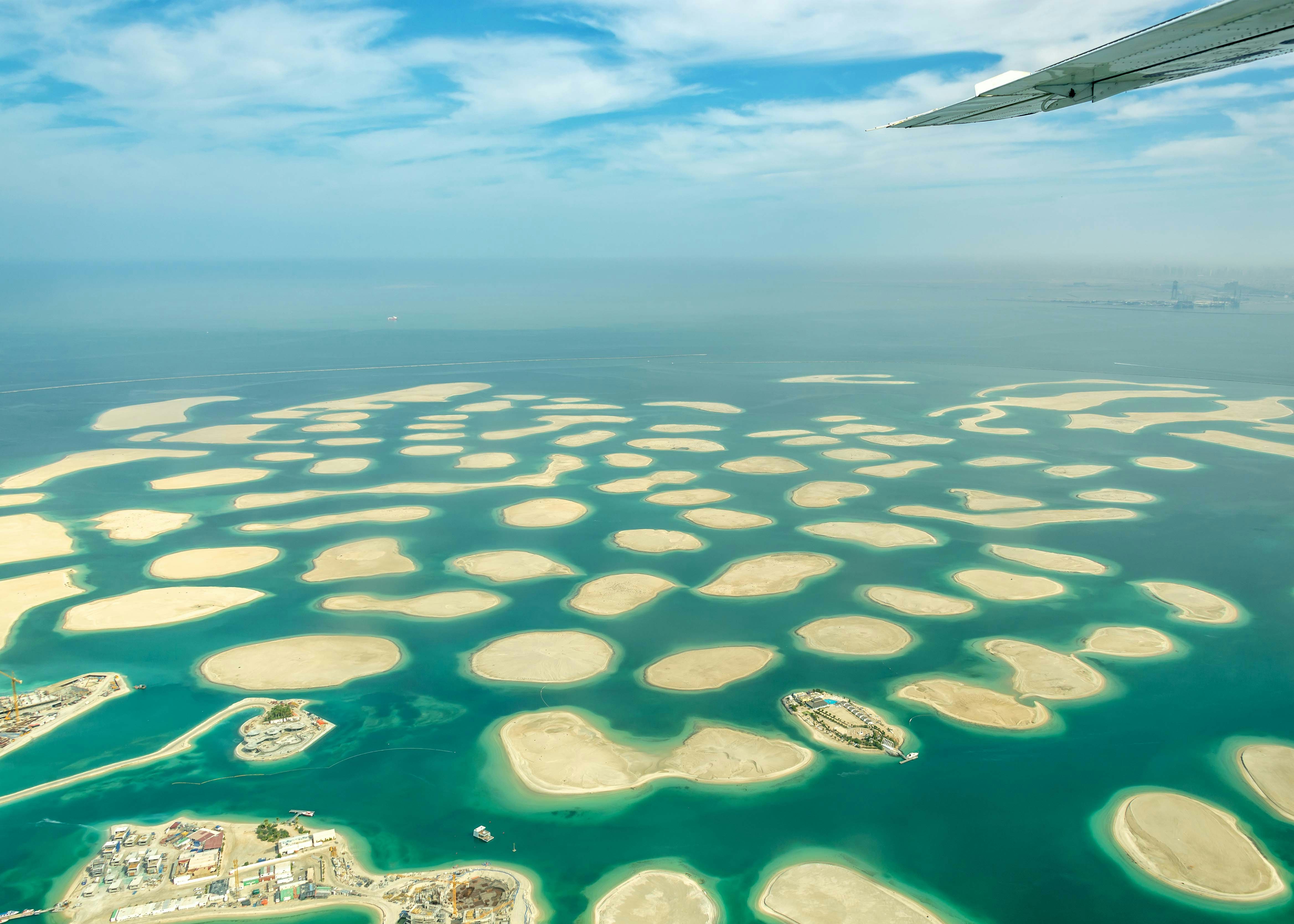 Aerial view of The World Islands in Dubai, showcasing man-made islands in the Persian Gulf.