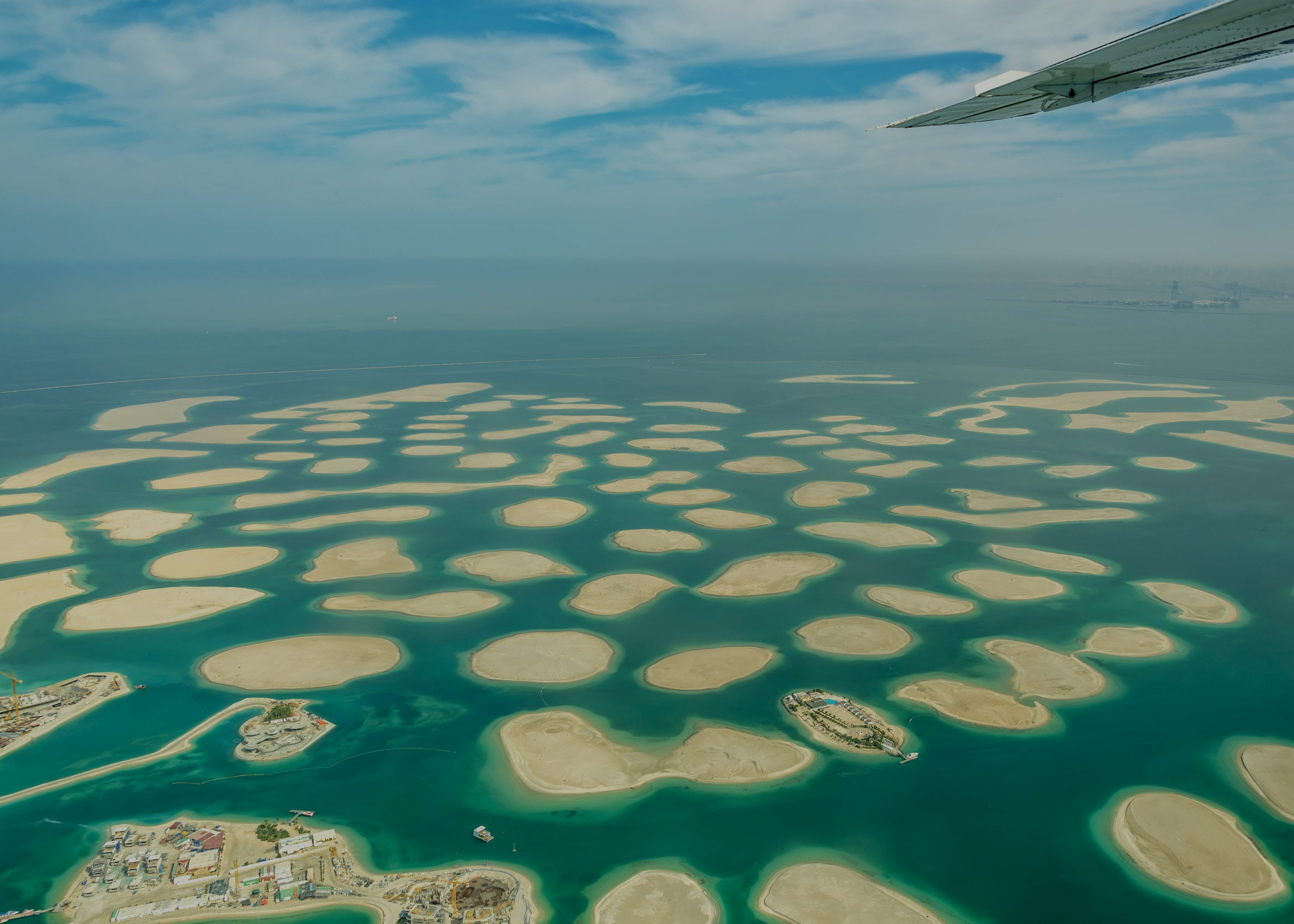 Aerial view of The World Islands in Dubai, showcasing man-made islands in the Persian Gulf.