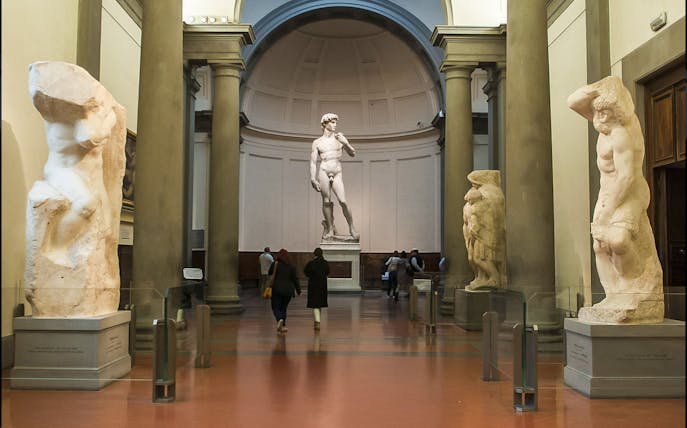 Accademia Gallery interior with Michelangelo's David statue, Florence tour.