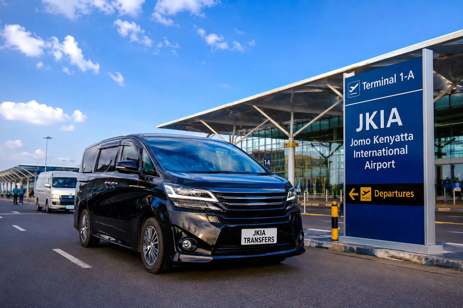 Transfer vehicle at Jomo Kenyatta International Airport, Nairobi, for Nairobi National Park game drive.
