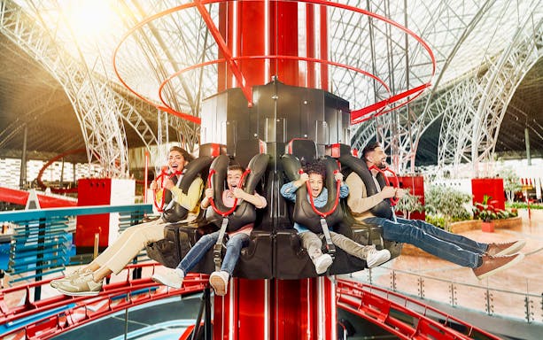 Visitors enjoying a thrilling ride at Ferrari World Abu Dhabi.