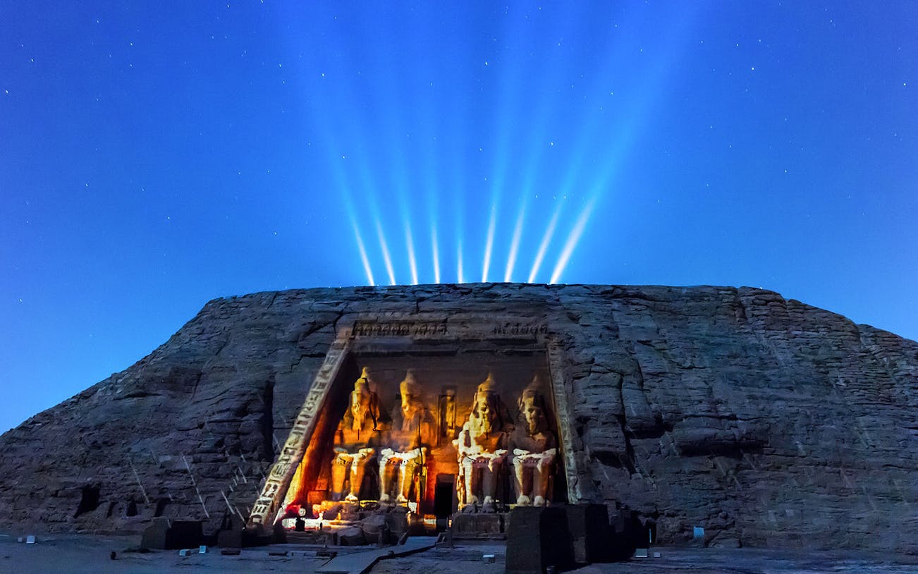 Abu Simbel temple illuminated at night, Aswan, Egypt, UNESCO World Heritage site.