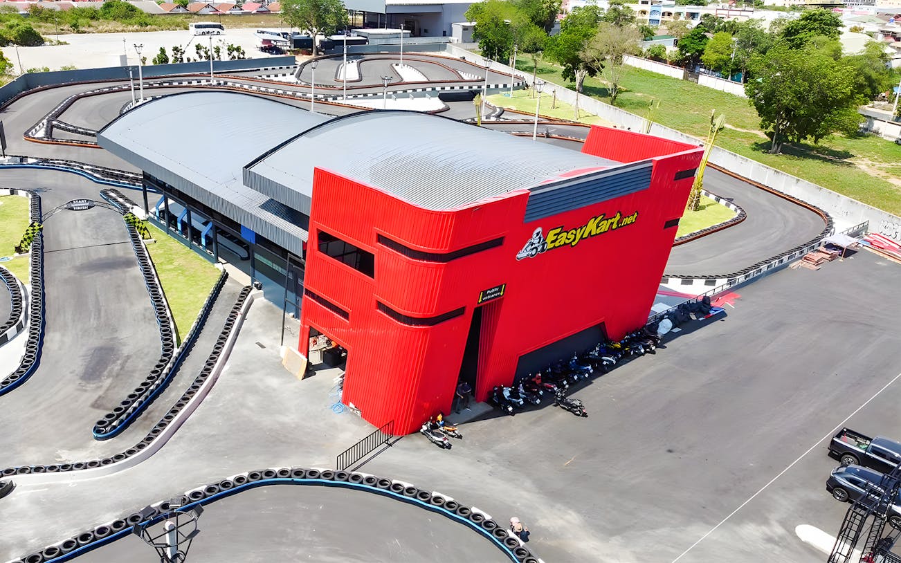 Outdoor go-kart track at EasyKart in Thepprasit Pattaya, featuring winding asphalt lanes.